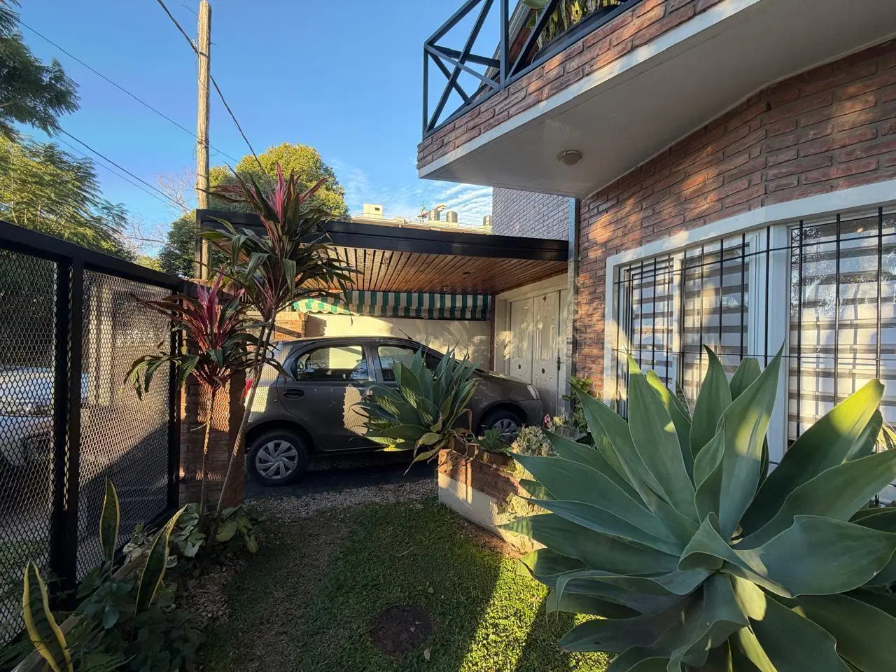Casa en Alquiler 4 dormitorios, quincho con parrilla y cochera en Fisherton - Rosario 4