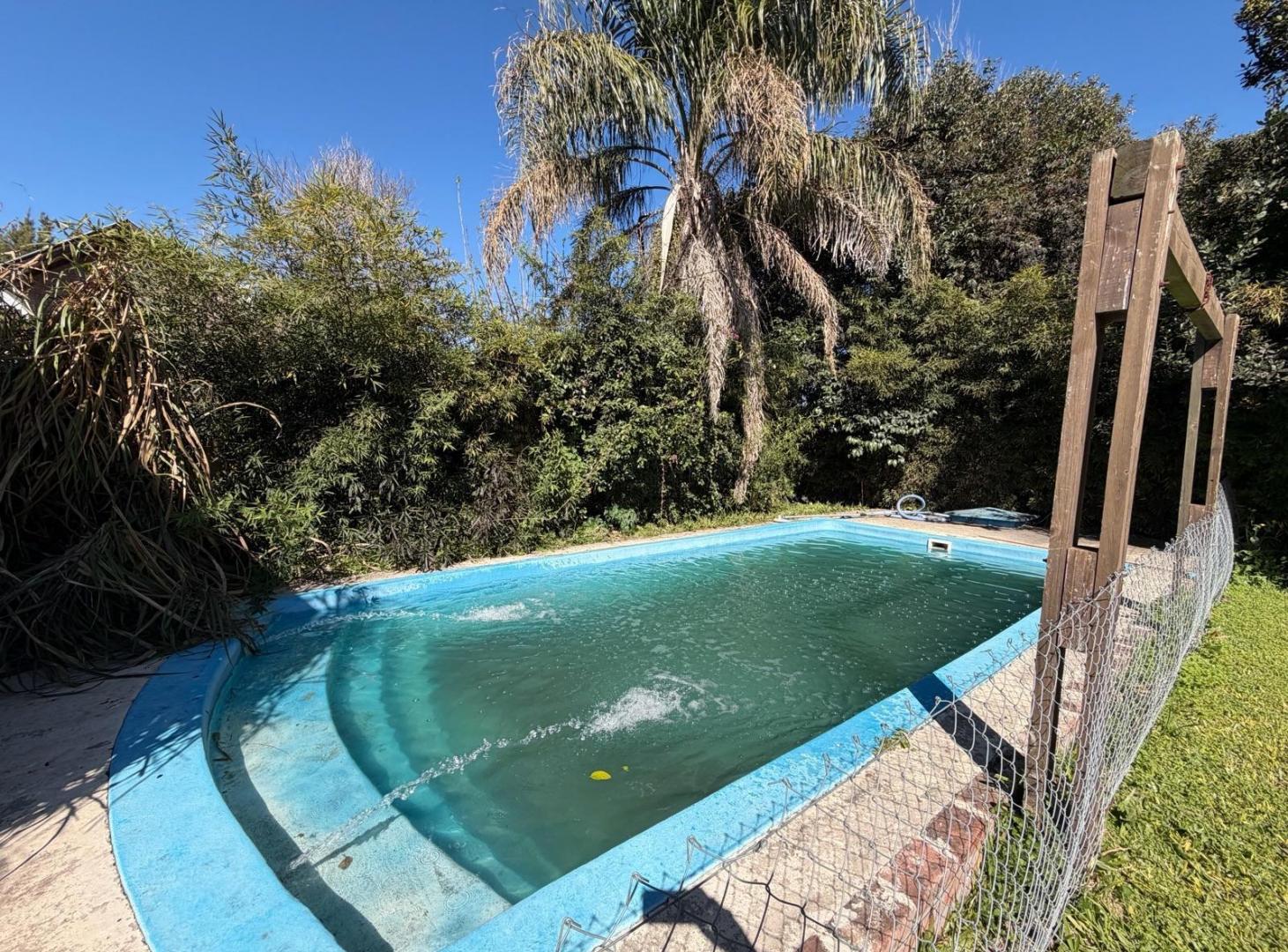 Foto de Casa en venta de 5 dormitorios y pileta en Funes, imagen 1