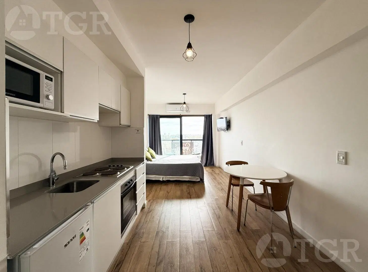 VENTA DEPARTAMENTO MONOAMBIENTE AMOBLADO-CON BALCÓN EN BRICKELL URQUIZA 3