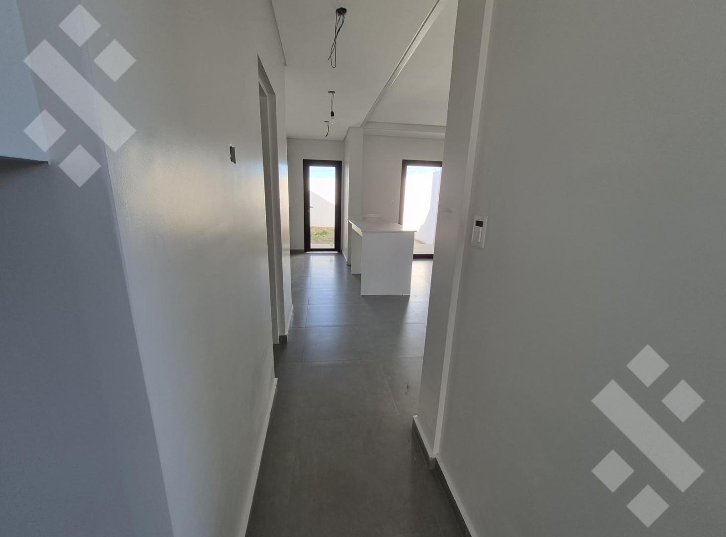 Foto de VENTA DÚPLEX 2 DORMITORIOS (A ESTRENAR) - B° JORGE NEWBERY, CIPOLLETTI, imagen 4