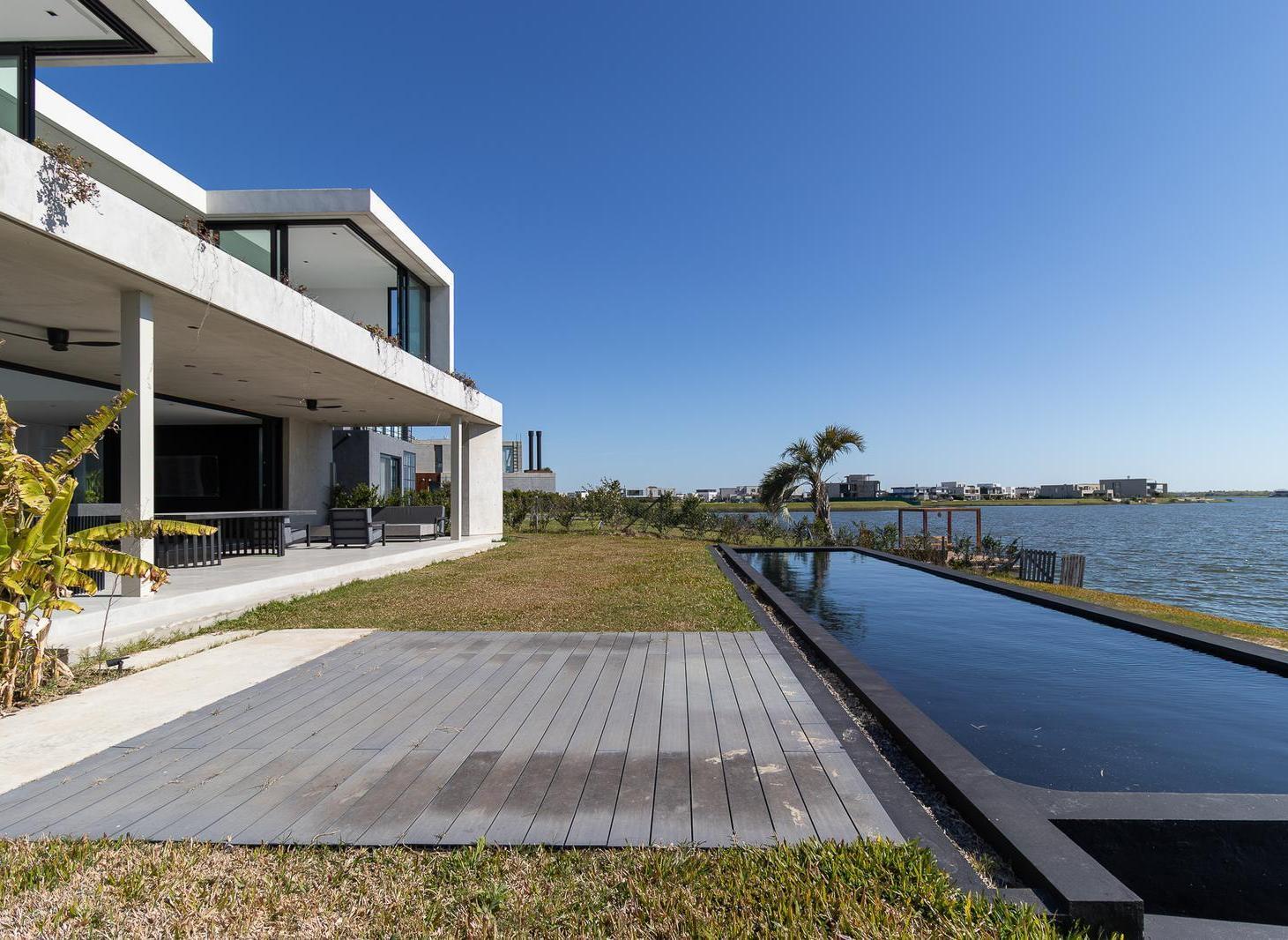 Foto de Casa al lago central en venta 4 dormitorios en suite, imagen 5