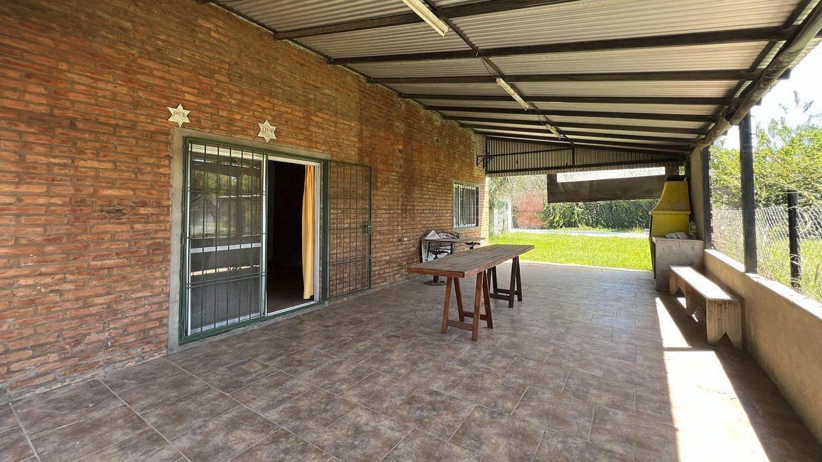 VENTA CASA EN ANDINO 1 DORMI-COCHERA-PILETA