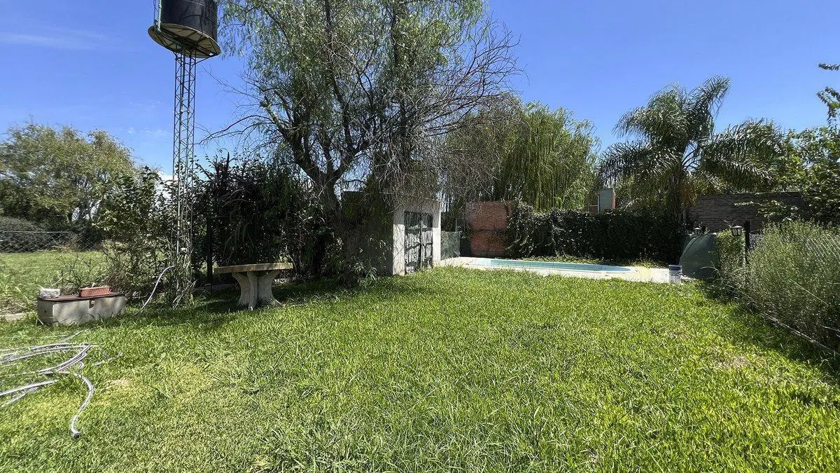VENTA CASA EN ANDINO 1 DORMI-COCHERA-PILETA 3