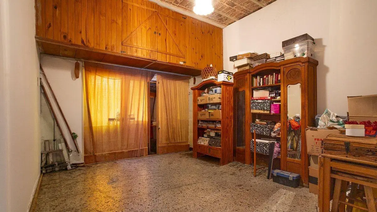 CASA DE UN DORMITORIOS, COMODIN Y COCHERA 3