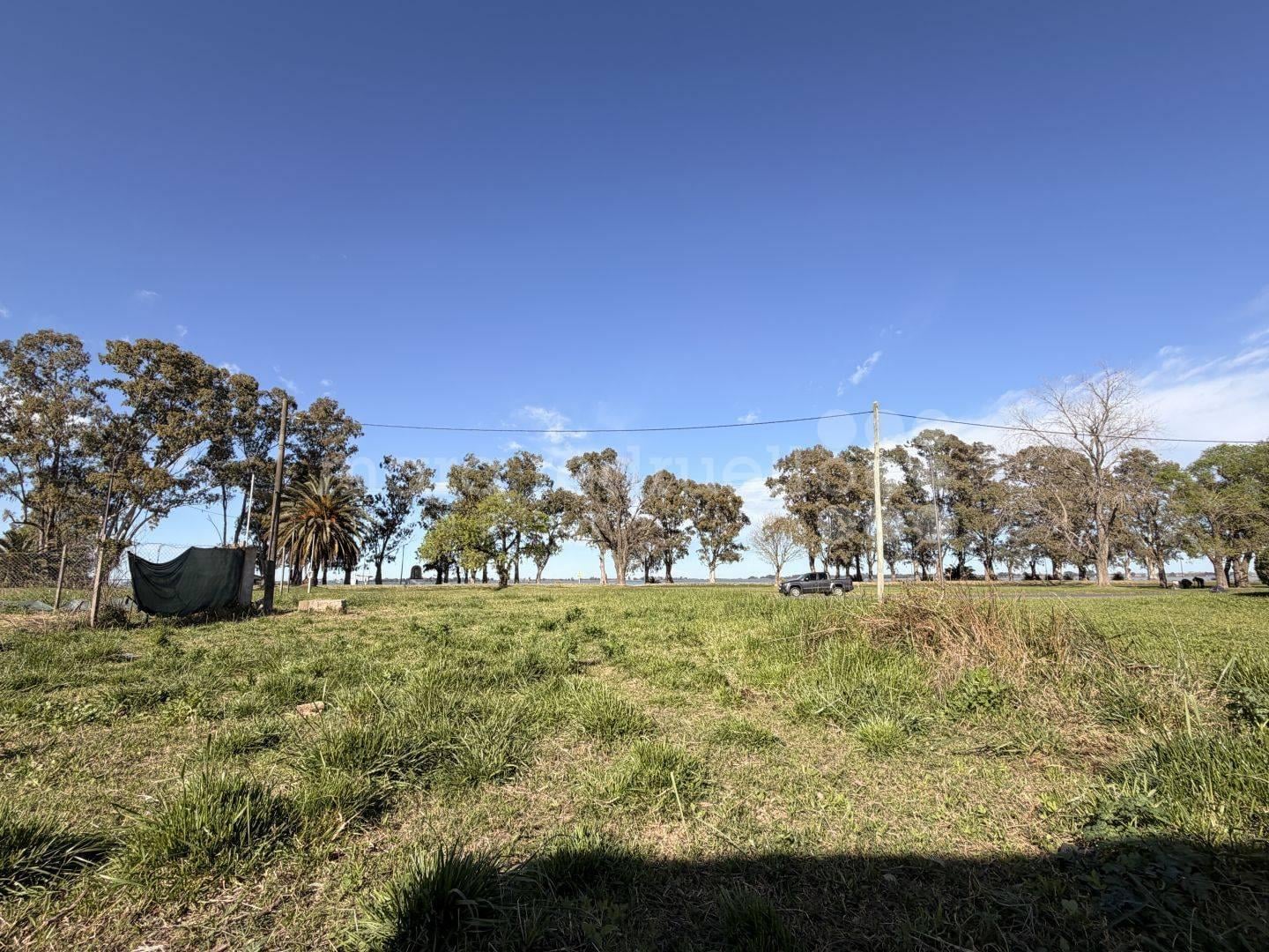 Foto de EN VENTA LOTE FRENTE LAGUNA DE CHASCOMUS CON TODOS LOS SERVICIOS, imagen 3