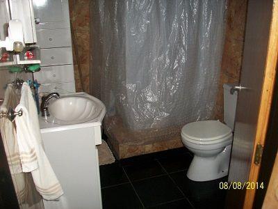 VENTA DE CASA EN BURZACO .LOTE 10 X 30 MTS.