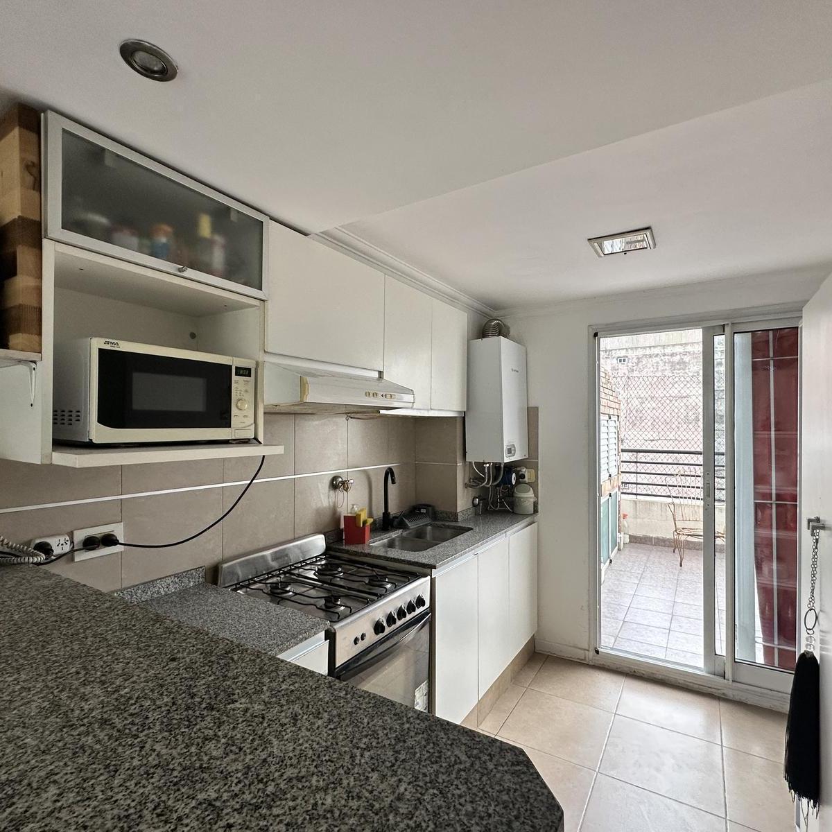 Departamento de Dos Dorm. y Cochera en Venta en Barrio Abasto 1
