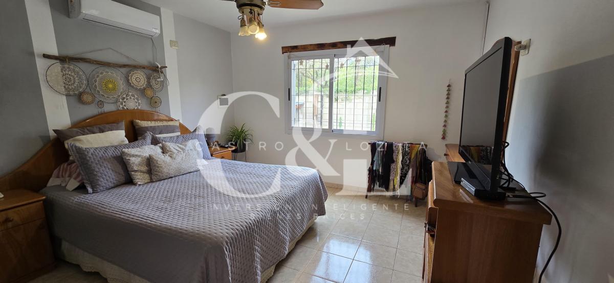 Potencial Casa de Campo con Terreno de 840 m² en La Comuna San Roque 3