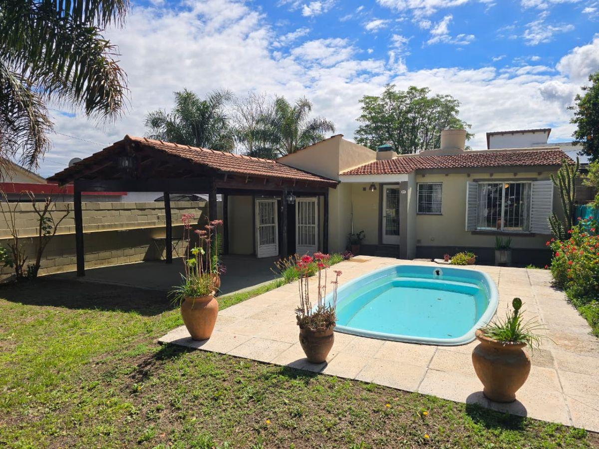 Foto de Venta: Casa en PH - 3 dormitorios - Pileta, patio y cochera - Malvinas, imagen 1