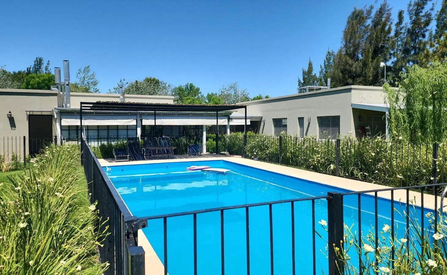 Casa 4 dormitorios en alquiler Chacra Los Raigales Roldan 4