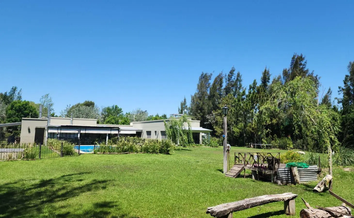 Casa 4 dormitorios en alquiler Chacra Los Raigales Roldan 2