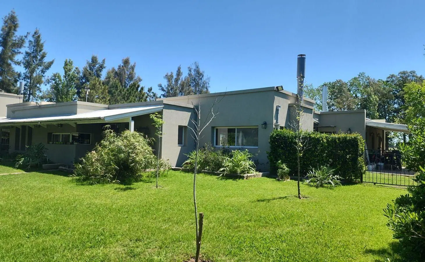 Casa 4 dormitorios en alquiler Chacra Los Raigales Roldan 1