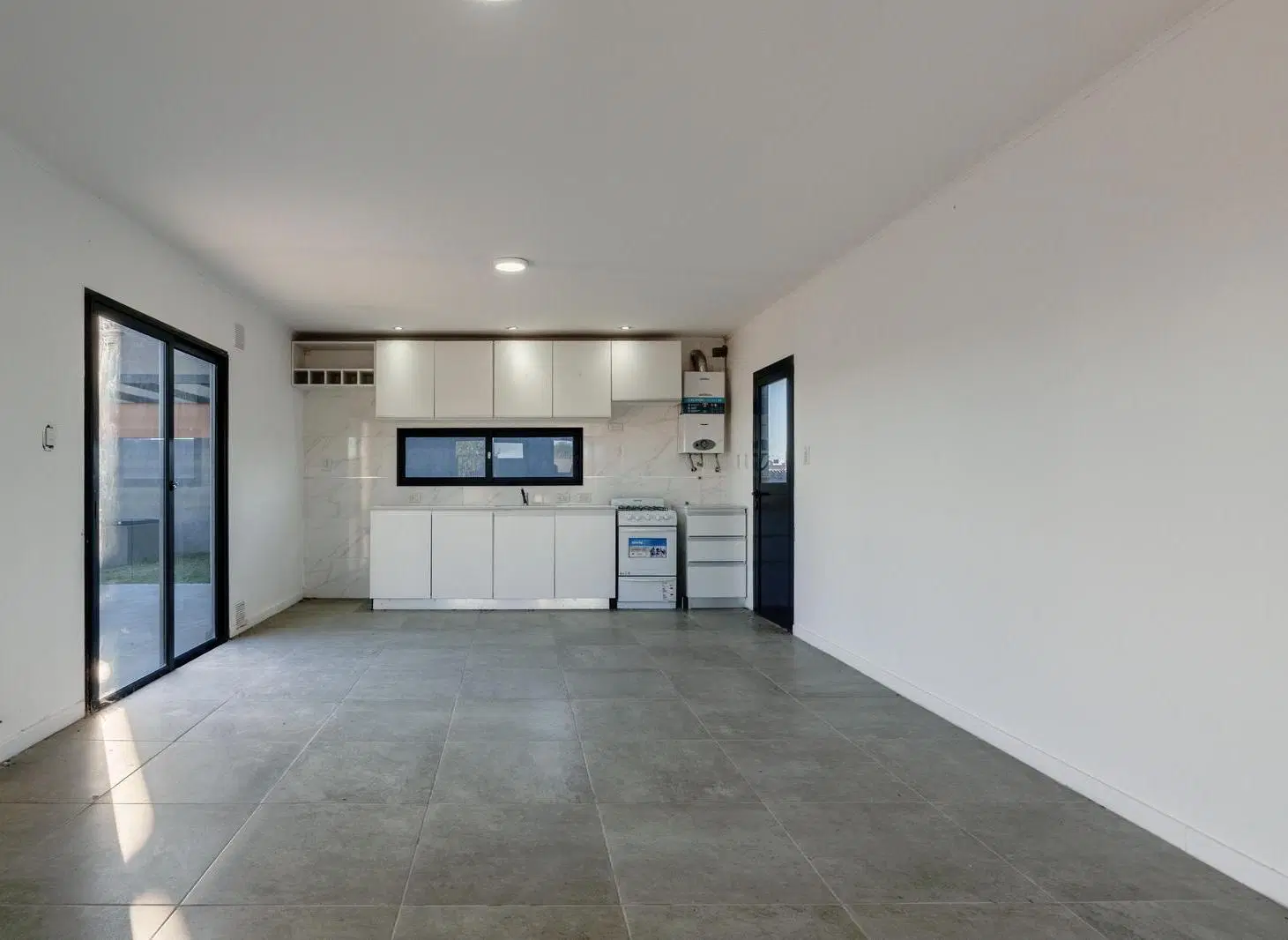 casa planta baja en venta funes 2 dormitorios amplio luminoso parrillero piscina jardin 4