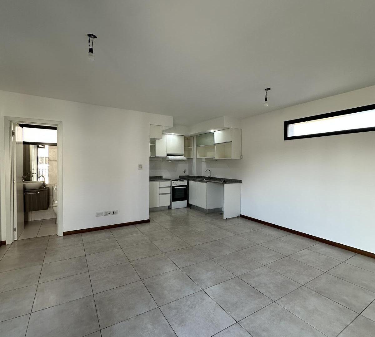 Departamento en alquiler de un dormitorio norte zona pichincha escalera moderno amplio