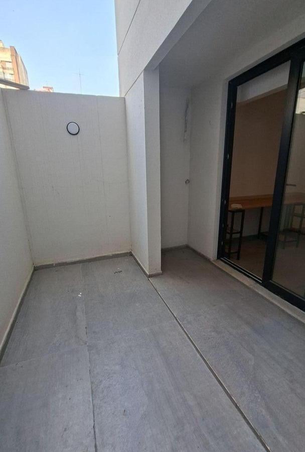 Foto de VENTA DEPARTAMENTO A ESTRENAR MONOAMBIENTE EN FLORES, imagen 4