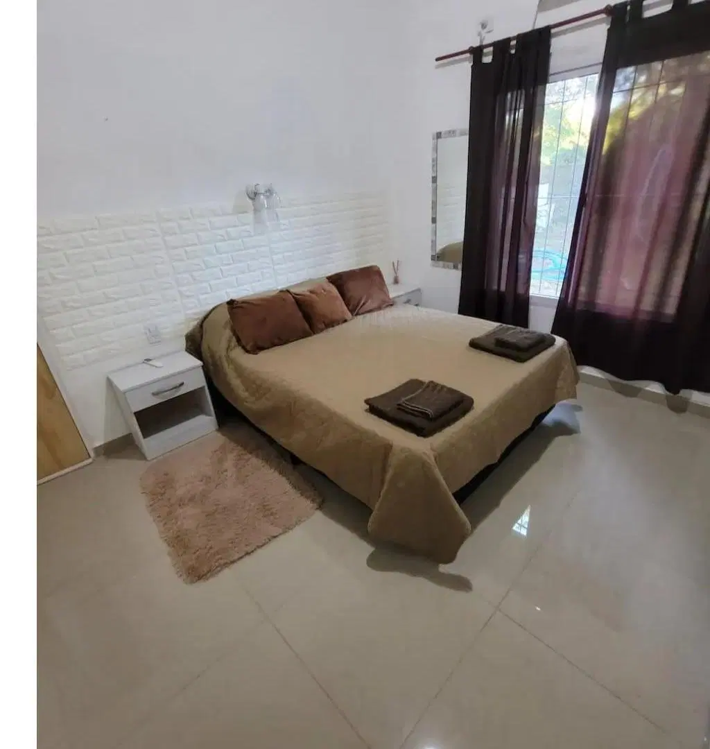 Casa 2 Dormitorios en "El Campito", barrio boscoso en Benítez 8