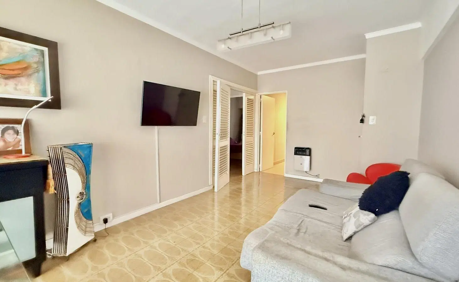 Departamento tres ambientes con cochera y patio cubierto 4