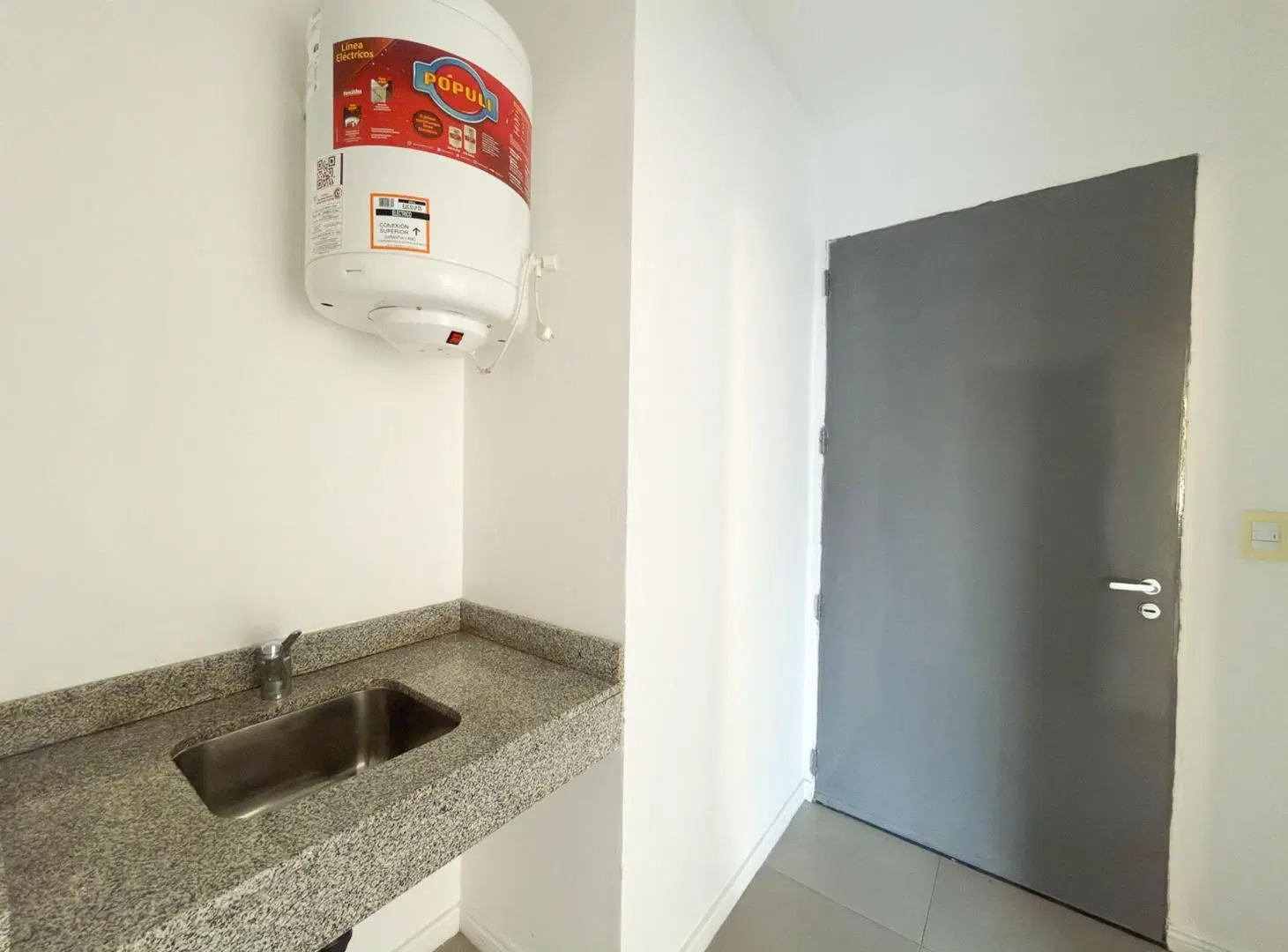 LOCAL EN VENTA TANDIL AL FRENTE SEMI CENTRO 5