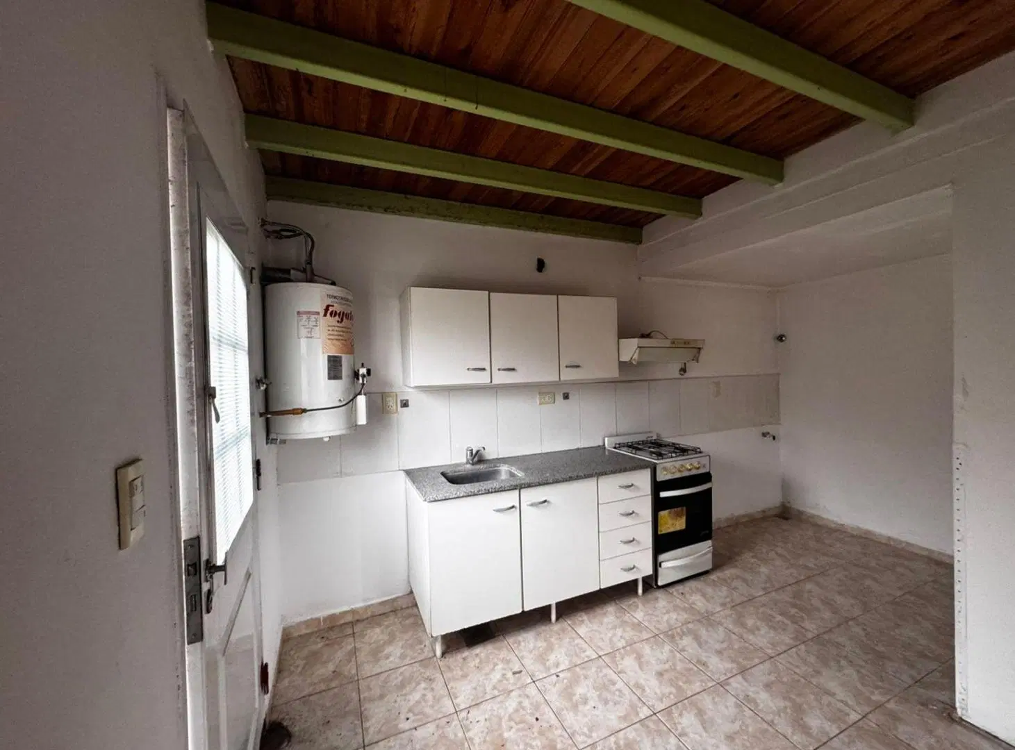 VENTA DE DEPARTAMENTO DOS DORMITORIOS, TANDIL. 8