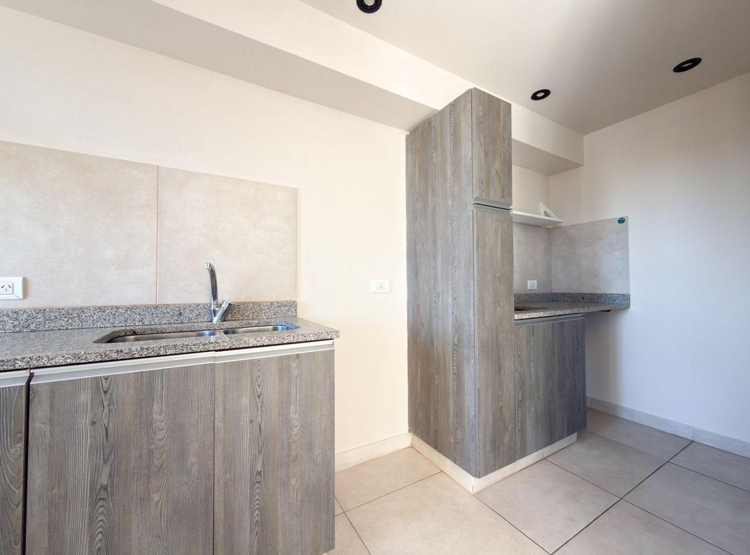 Foto de DEPARTAMENTO 1 DORMITORIO VENTA TANDIL SUM, imagen 4