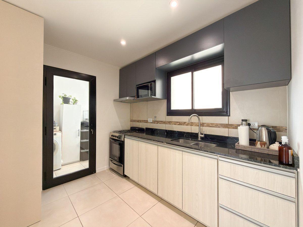Foto de VENTA DEPARTAMENTO 2 DORMITORIOS COCHERA TANDIL, imagen 4
