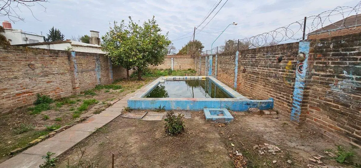 Casa mas terreno ideal para inversión 4
