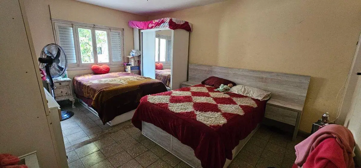 VENTA CASA DE 2 DORMITORIOS, COCHERA Y GRAN PATIO 5