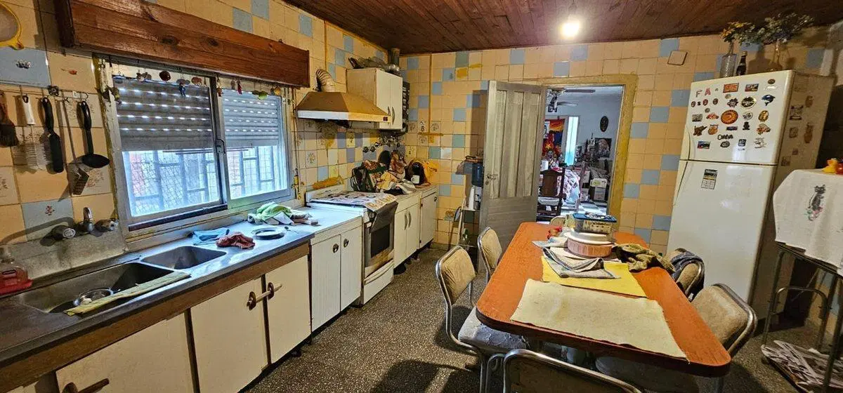 Casa mas terreno ideal para inversión 8
