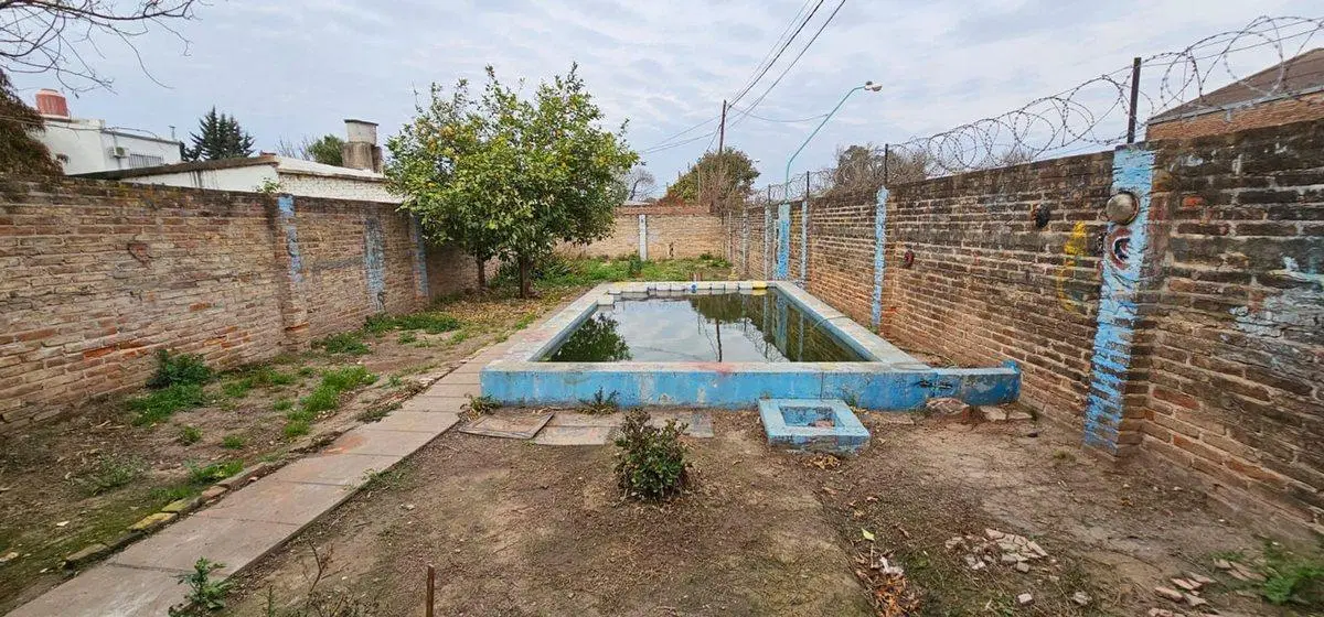 Casa mas terreno ideal para inversión 5