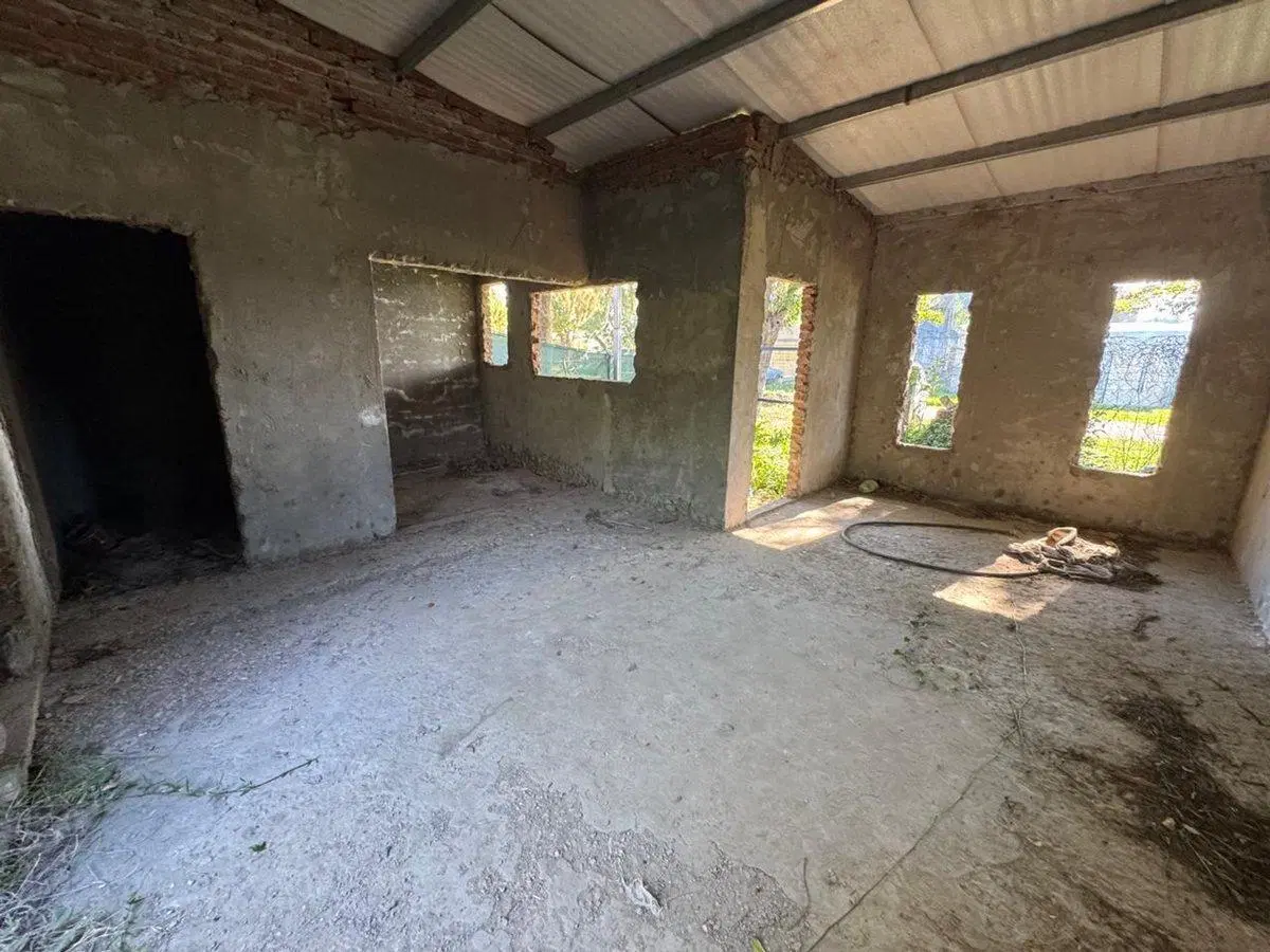 TERRENO A LA VENTA CON CONSTRUCCION AVANZADA 1