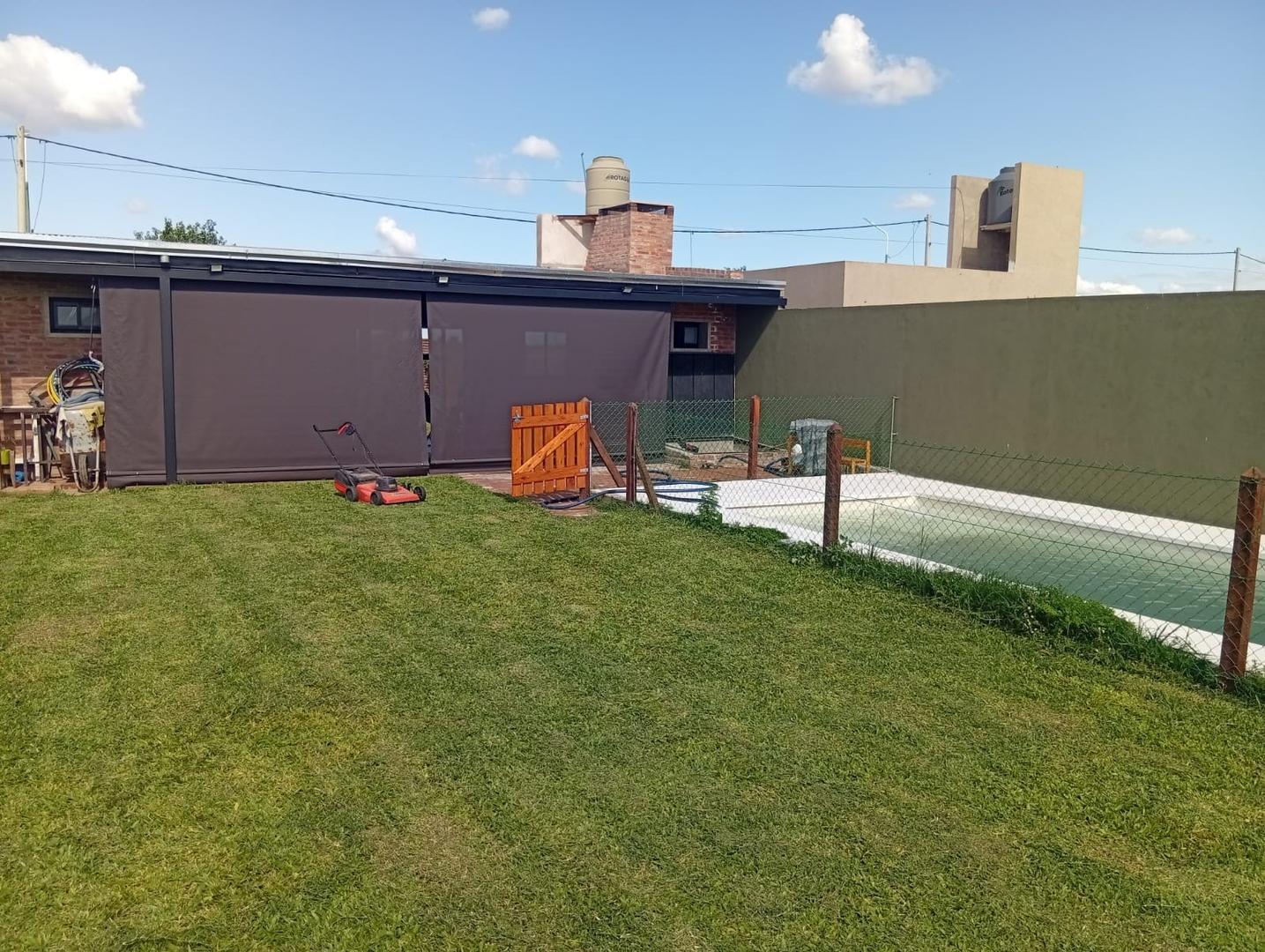 Foto de QUINCHO EN VENTA, BAÑO Y PISCINA LOTE DE 300M2 EN LA TOSCANA, imagen 3