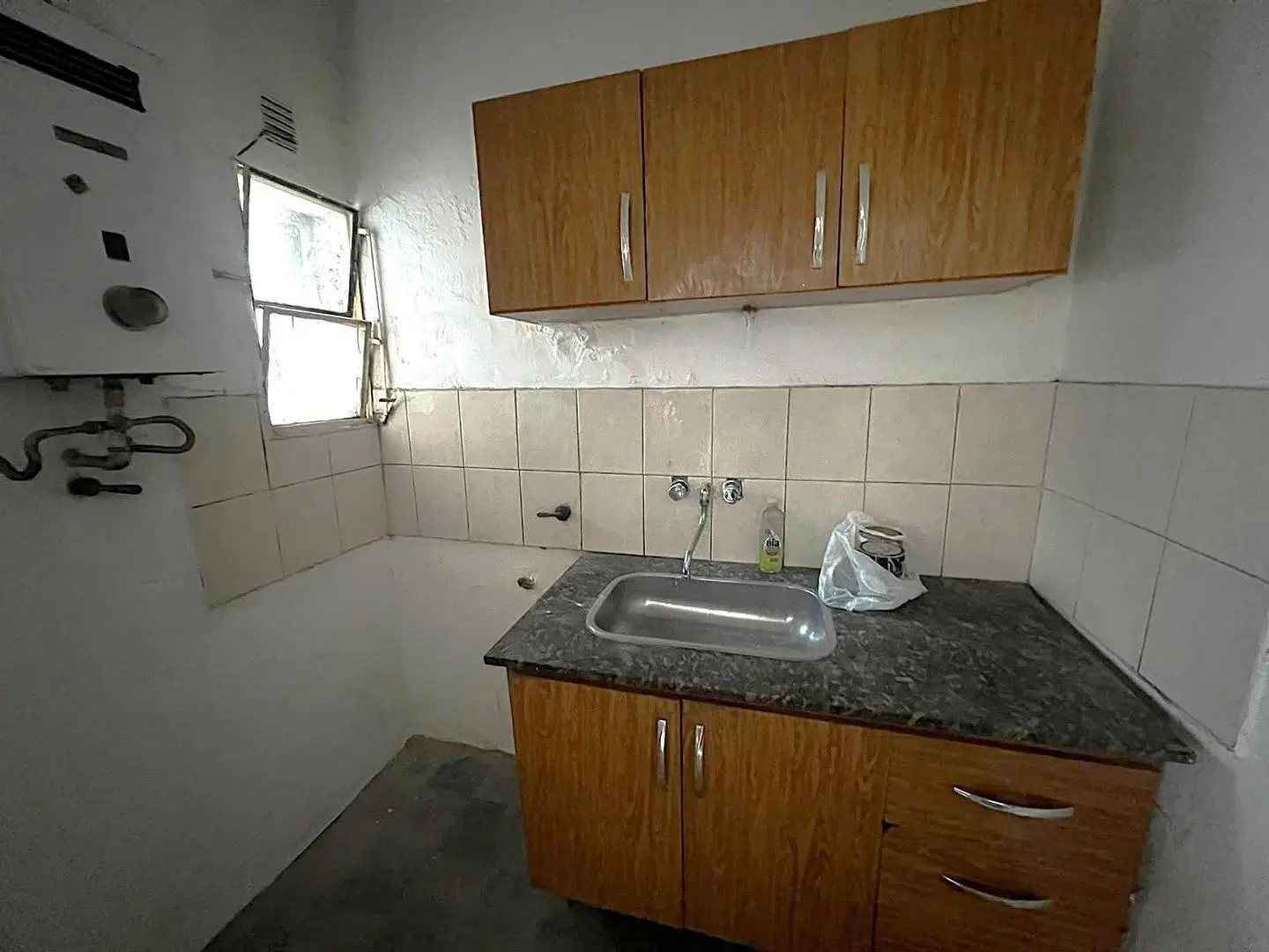 SE ALQUILA CASA EN BARRIO SAN MARTIN, SIN EXPENSAS!! 5