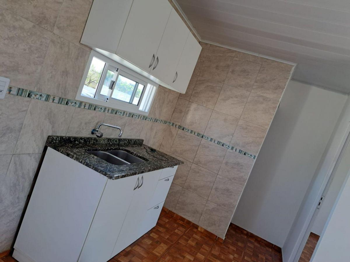 En Venta Complejo de 3 Deptos y 1 Local Comercial. 3