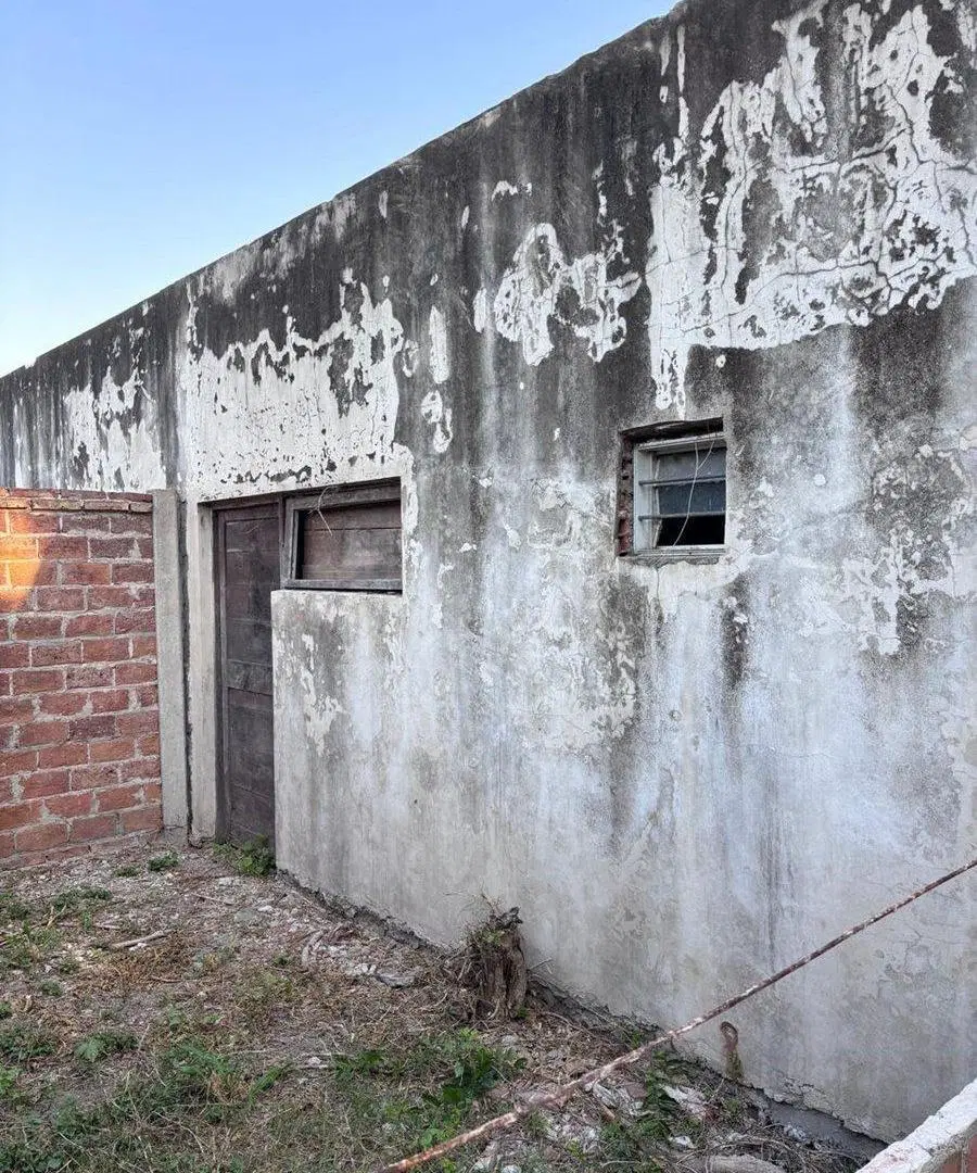 Se vende lote con construcción. 8