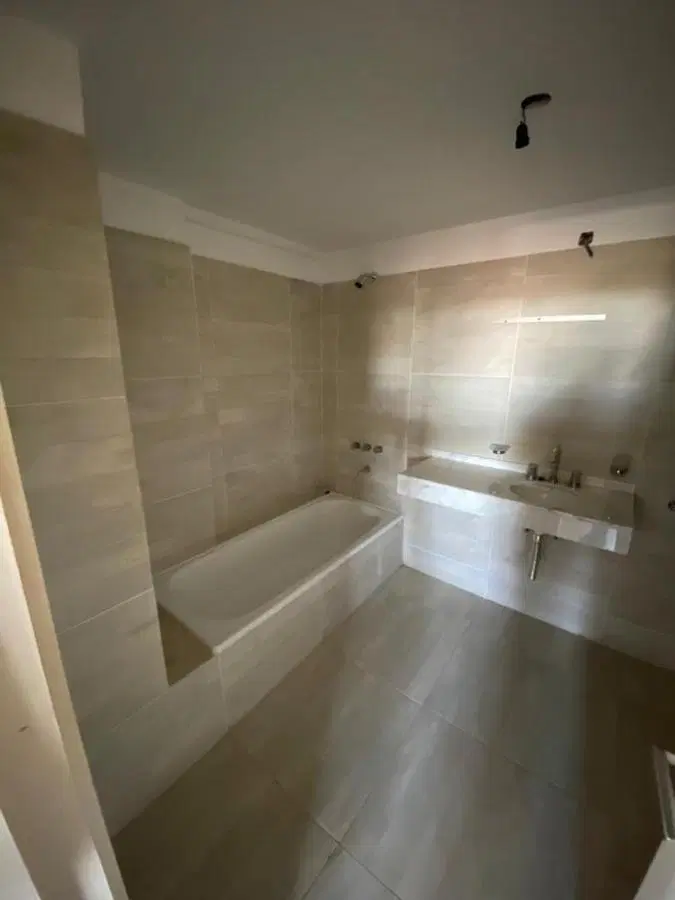 Departamento 1 Dormitorio en condominio c/cochera fisherton 2