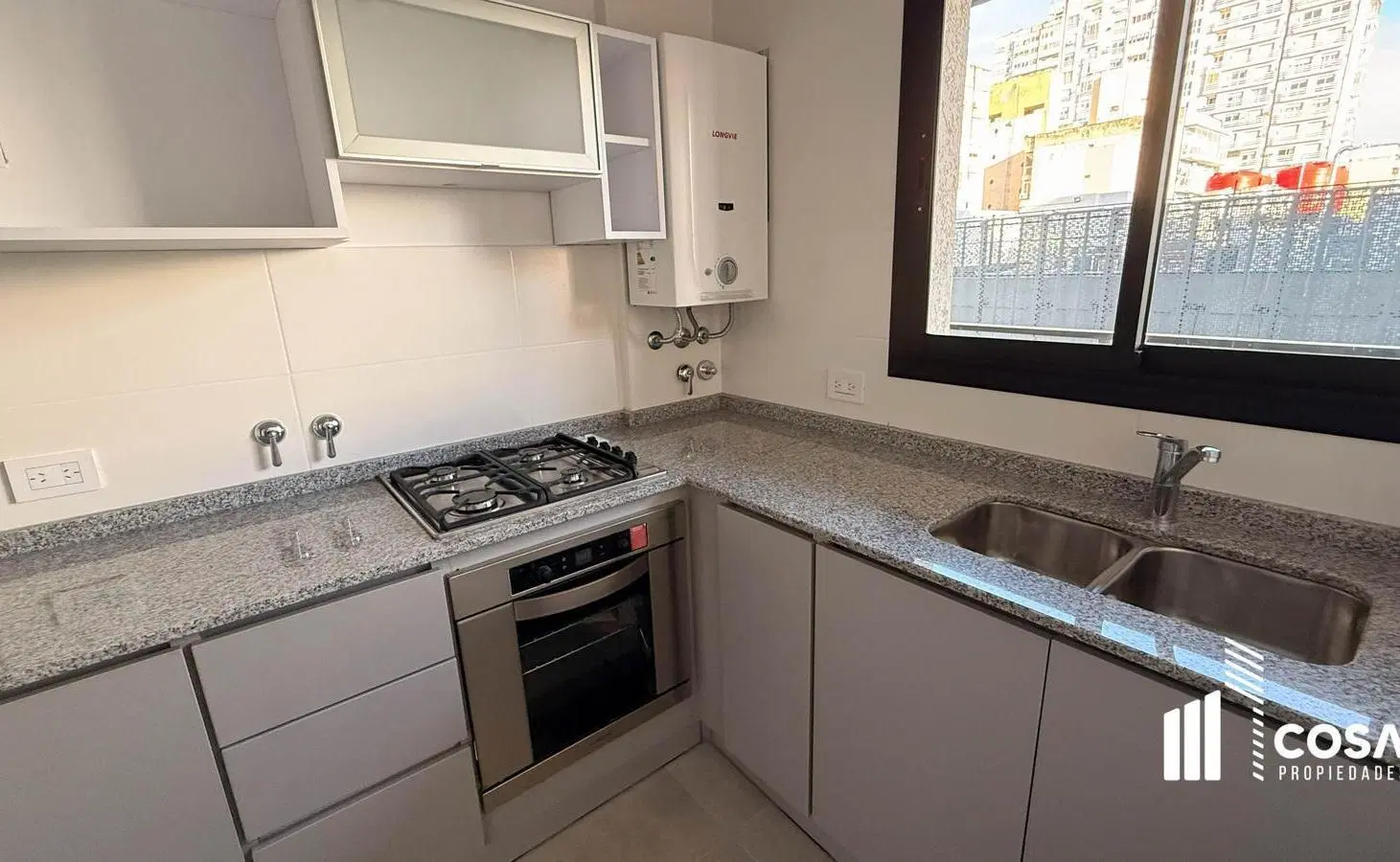 Venta Departamento 2 dormitorios con cochera Centro Rosario 8
