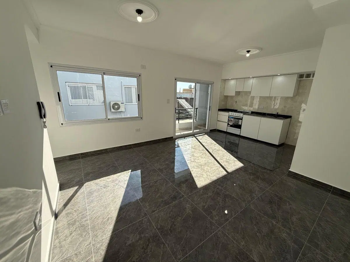 Venta de departamento dos ambientes con terraza propia y dos balcones 1