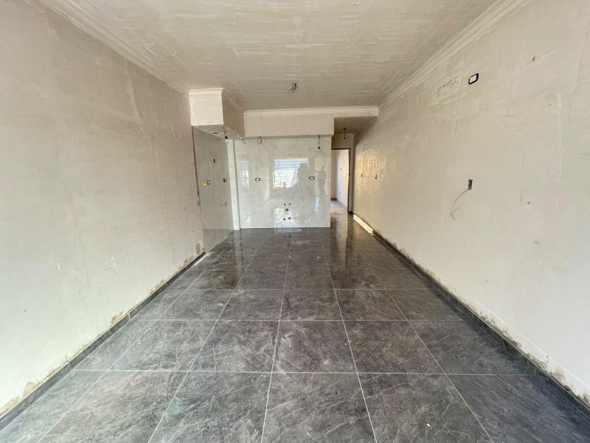 Foto de Departamento dos ambientes en planta baja con patio y cochera a estrenar, imagen 2