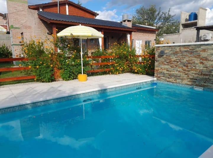 Foto de Casa en Mina Clavero Complejo de 4 Cabañas Pileta Cochera Asador Venta San Sebastián, imagen 3