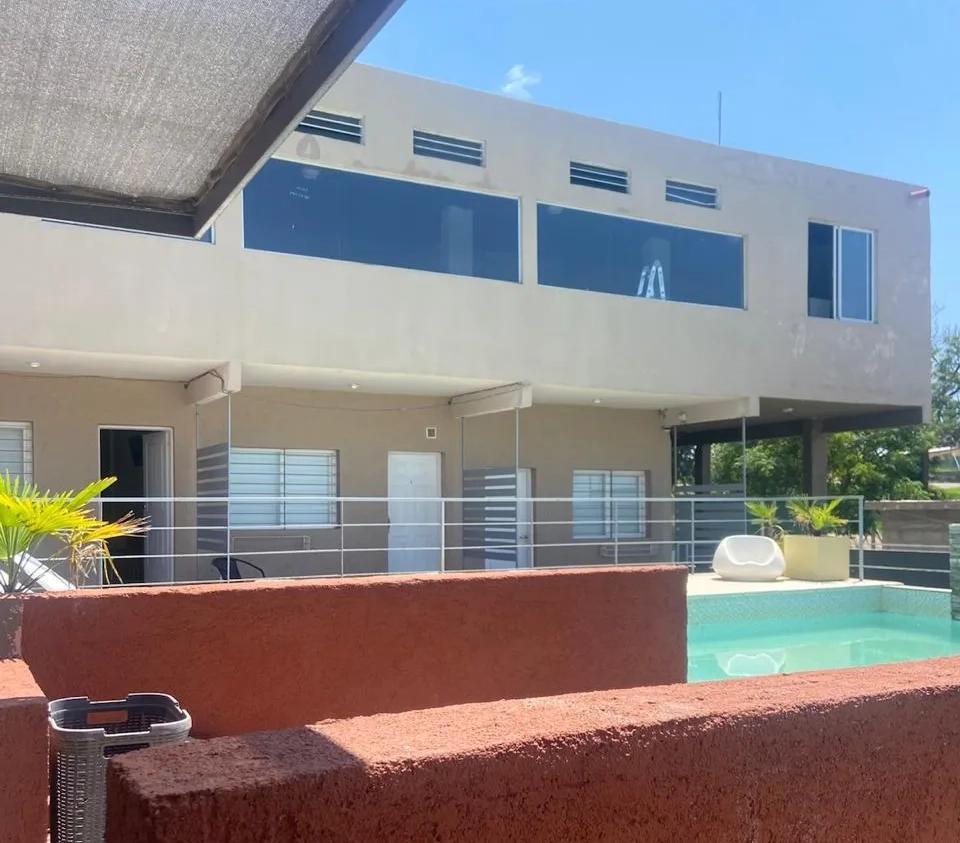 ¡Oportunidad de Inversión en Villa Santa Cruz del Lago: Complejo Turístico y Salón de Eventos!