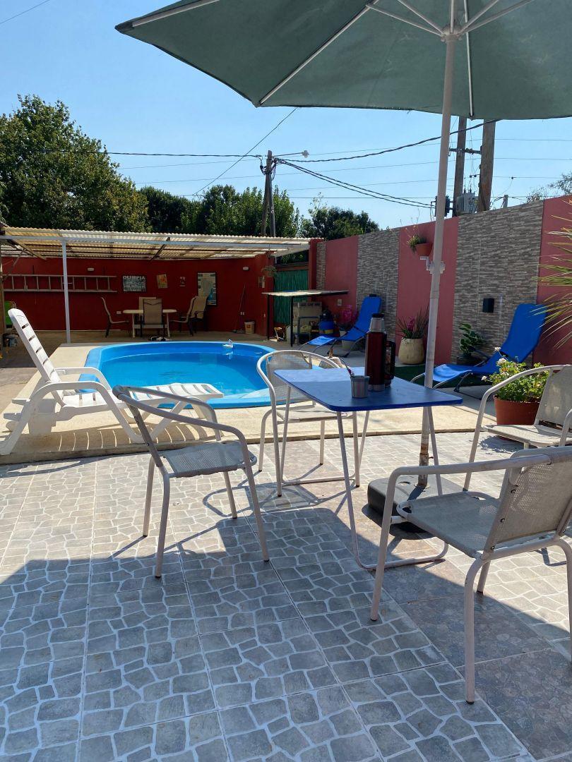 Foto de Venta de Casa 3 DORMITORIOS con quincho y pileta, entre caminos en, imagen 4