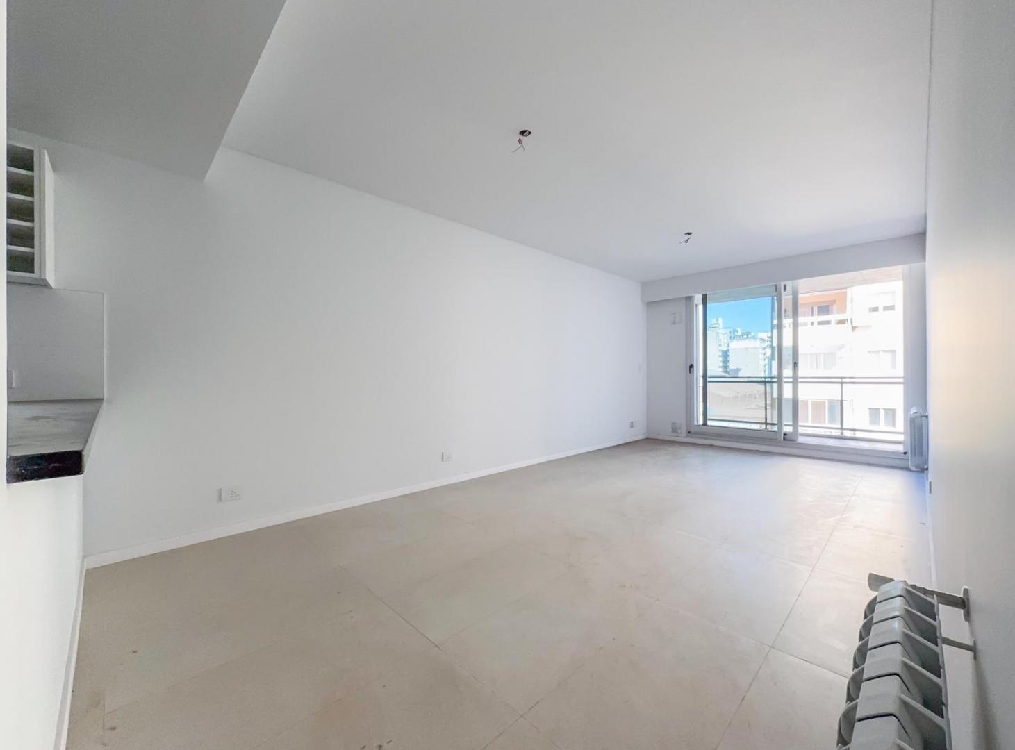 Foto de Departamento 2 dormitorios, estrenar, cochera, zona rio, radiadores, imagen 1
