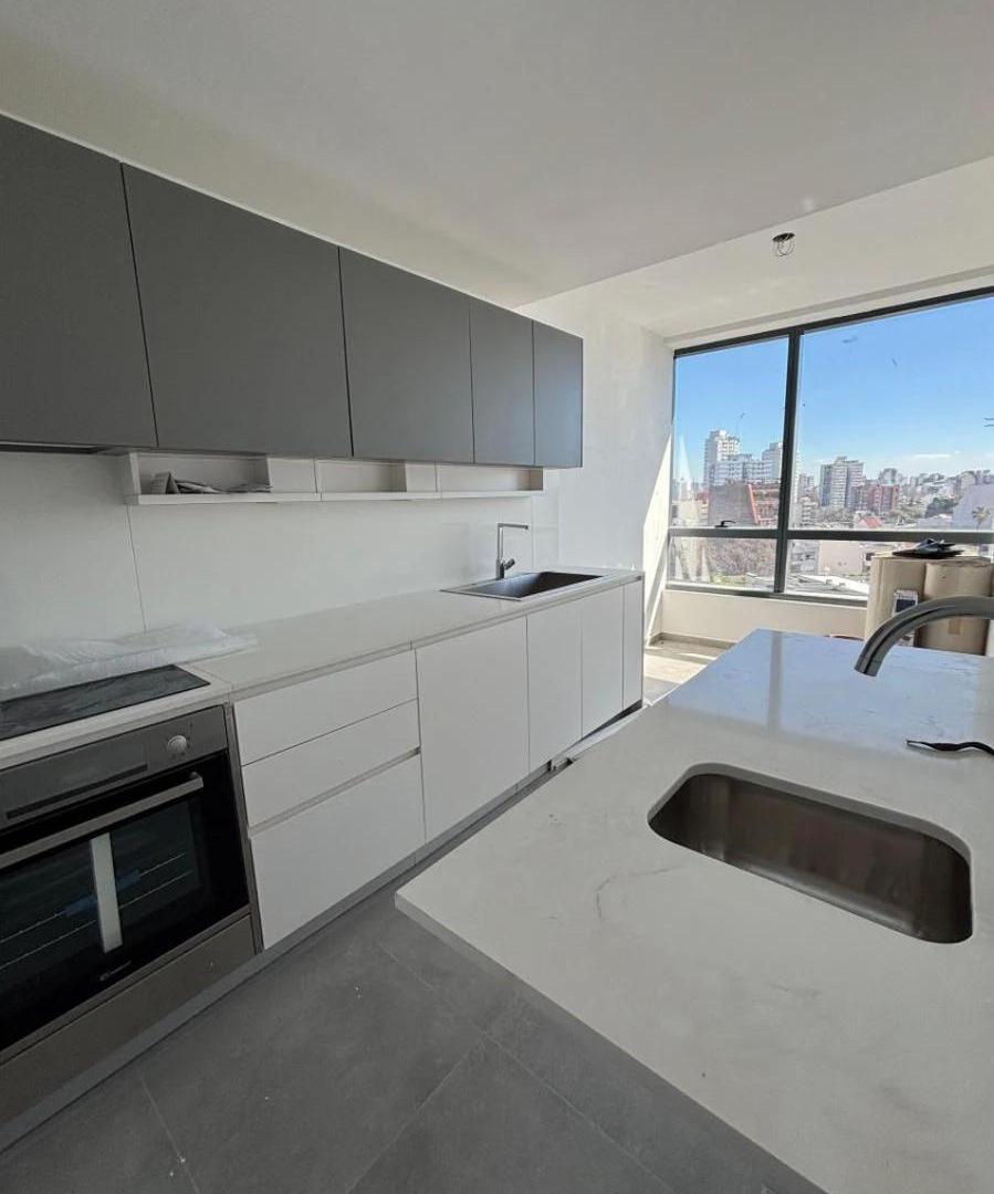 Foto de VENTA CON RENTA DEPARTAMENTO 4 AMBIENTES QUANTUM BELLINI TORRE, imagen 2