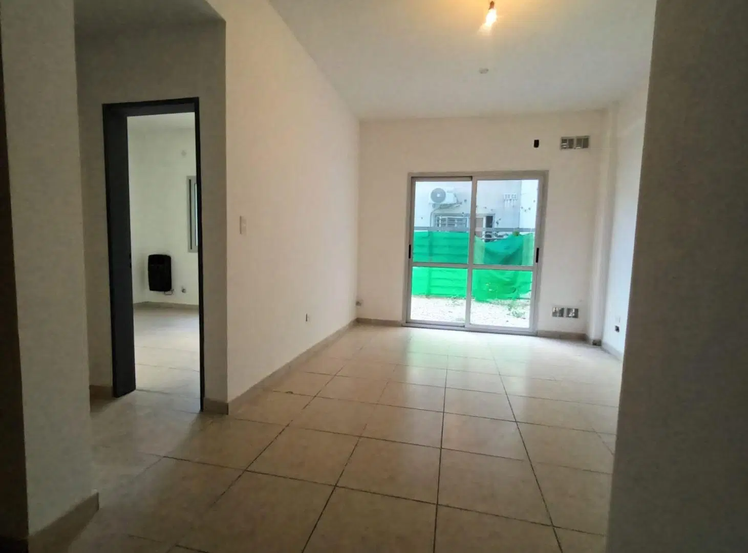 VENTA DPTO 2 AMBIENTES PATIO Y COCHERA EN MERLO 5