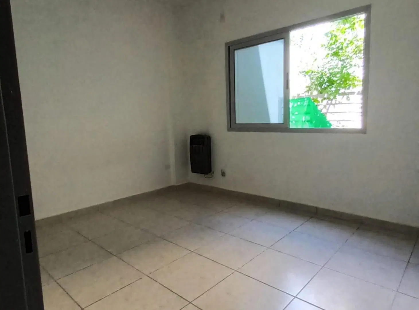 VENTA DPTO 2 AMBIENTES PATIO Y COCHERA EN MERLO 3