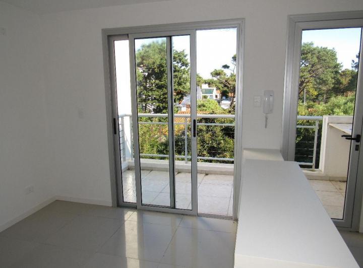 Terraza exclusiva con parrillero 4