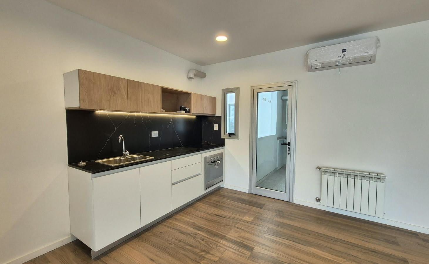 Foto de VENTA DEPARTAMENTO 2 DORMITORIOS A ESTRENAR CON COCHERA - 58 ENTRE 13 Y, imagen 1
