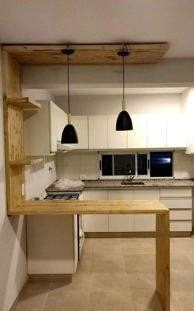 VENTA DEPARTAMENTO 2 DOMITORIOS Y COCHERA 4