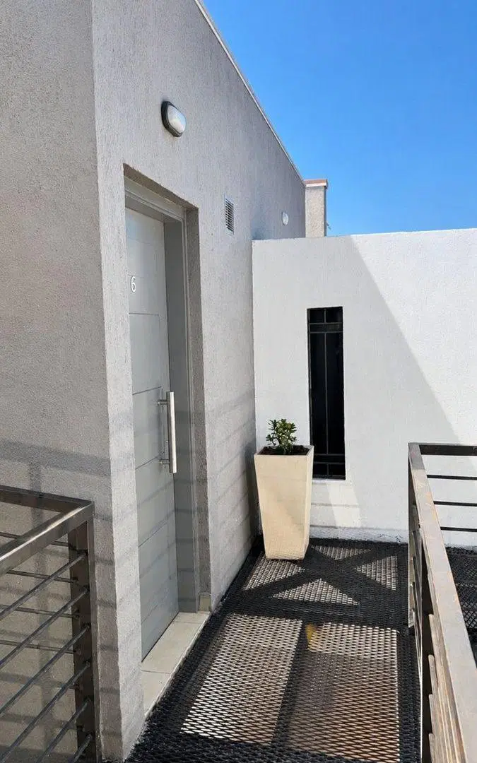 VENTA DEPARTAMENTO 2 DOMITORIOS Y COCHERA 5