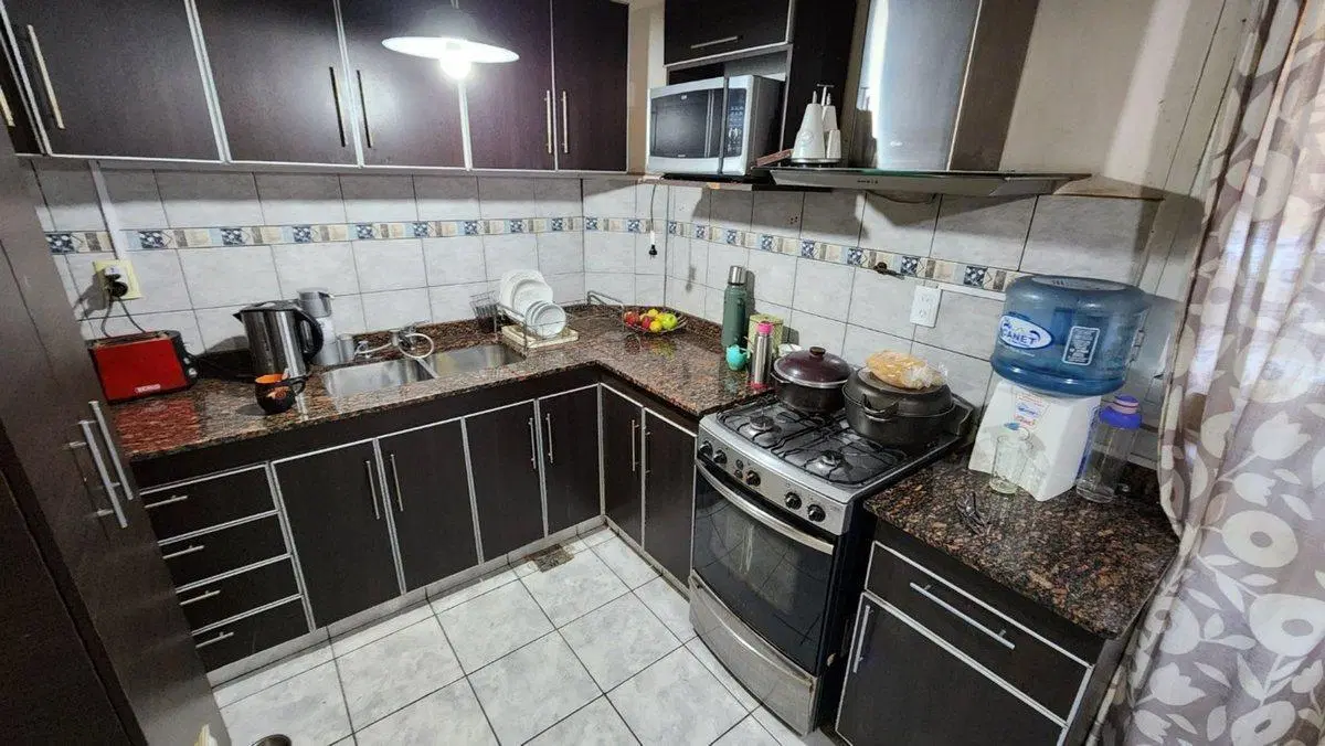 Venta Depto PB Céntrico 2 Dorm. Cocheras y Patio 4